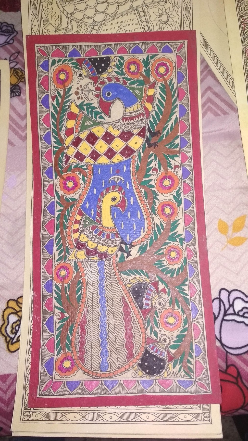 A detailed Madhubani painting showing the characteristic dense linework and double-line borders